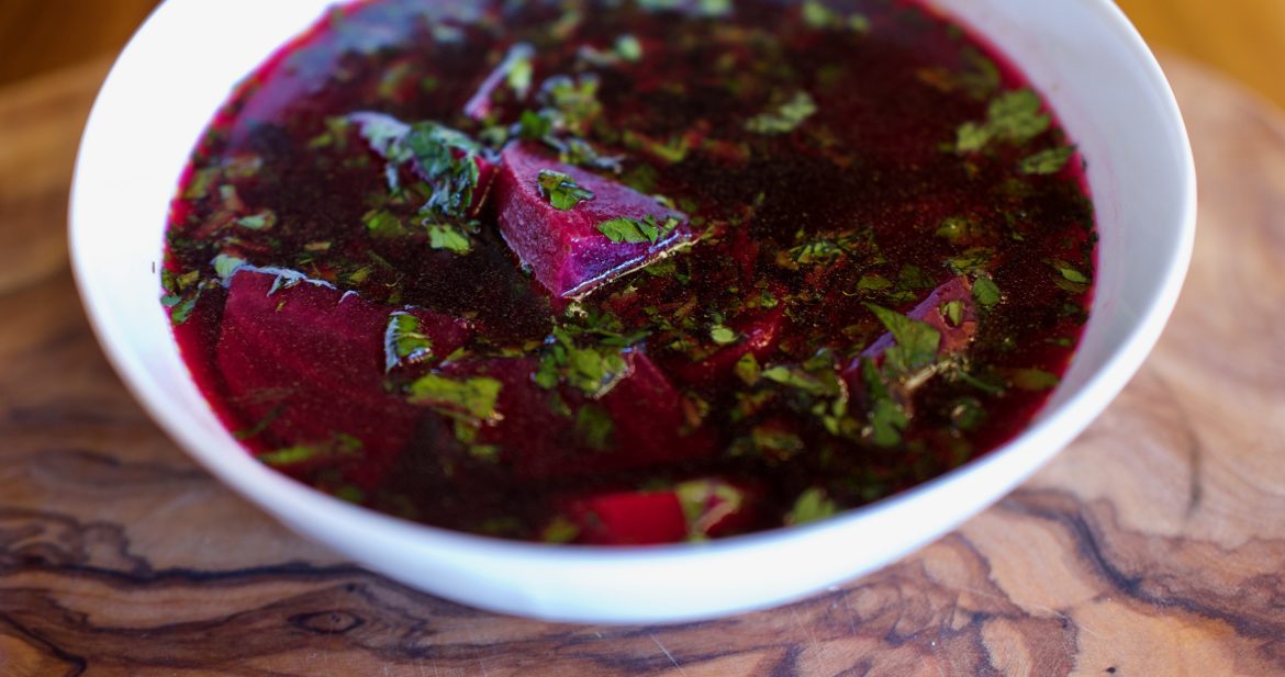 Polish Red Beet Soup, Polish Borscht Recipe, vegan beet soup with carrots parsnip parsley in a bowl by foodjoya